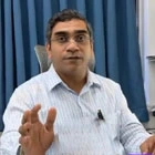 Dr. Mukesh Dhande